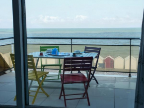 Face à la mer : appartement lumineux